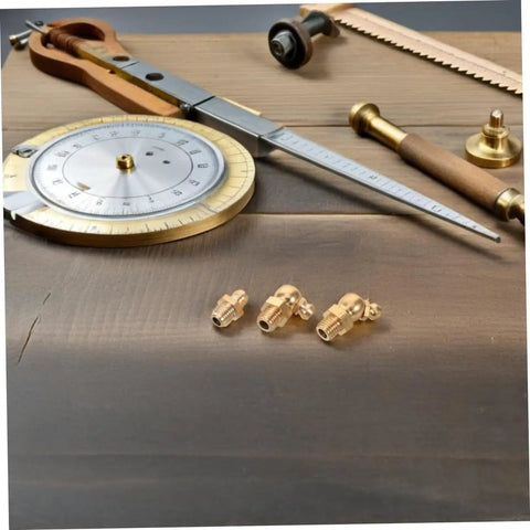 9 Piece Grease Fitting Assortment Kit With Copper Nipples For Cars And Trailers on wooden surface with brass fittings.