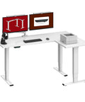 Rock Solid White L Shaped Electric Standing Desk Equipped With Triple Motor Height Adjustment For A Fully Ergonomic Home Office Setup showing dual monitors and printer.