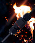 Close-up of IP68 Waterproof Outdoor Junction Box with cable against fiery background, showcasing durability.