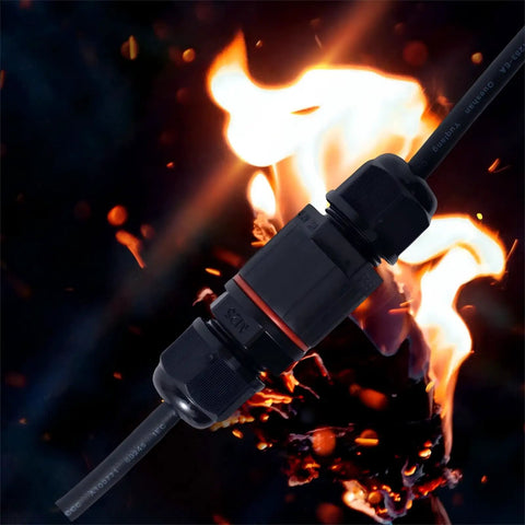 Close-up of IP68 Waterproof Outdoor Junction Box with cable against fiery background, showcasing durability.