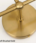 Close-up view of the base of Dope Mid Century 3 Light Vanity Fixture With Smooth Brushed Gold Finish.