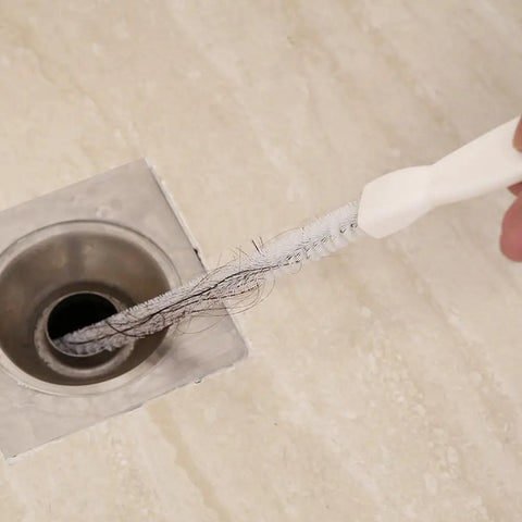 Sink Drain Overflow Cleaning Brush 17.7 Inch Long Flexible Hair Catcher Tool removing hair from a drain.