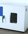Heavy Duty Green Plastic Oven Handle Replacement For Commercial Food Service Equipment on a white industrial drying oven.