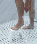 Ultra Lightweight Grab And Go Multi Purpose Foot Stool For Toilet Use, Desk Foot Rest, Pedicure, Leg Shaving And Lace Up Shoes, Stackable White Travel Must Have Made In USA used for leg shaving in shower