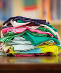 Stack of assorted color low lint reclaimed cotton polo shop rags for auto home and workshop use, eco-friendly upcycled towels.