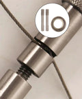 Manual Camping Rope And Dehorning Wire Tool For Animal Handling And Outdoor Gear, close-up of stainless steel wire with handles and rope.