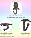 Set Of Two Cast Iron Owl Wall Hooks Super Heavy Duty Rustic Coat Rack Hangers Old School Vibe Built Like A Tank Sturdy As Nails To Hang Your Outerwear Inside close-up of cast iron owl hook with curved design