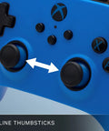 Close-up of the Officially Licensed Symmetric Wired Xbox Controller in Blue for Series X and S showing inline thumbsticks.