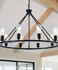 Black Farmhouse Wagon Wheel Chandelier With 10 Lights 31.5 Inch Old School Vintage Industrial Round Hanging Ceiling Pendant Light Fixture For Kitchen Island Living Room Dining Room Bedroom Hallway Entryway Foyer, showing a close-up of the matte black finish and exposed bulb design.