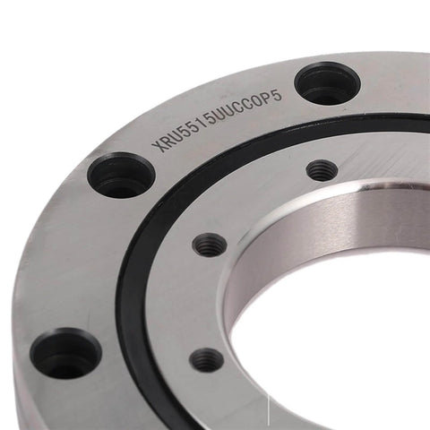 Close-up of a heavy duty small slewing bearing for precision machinery and robotics, featuring a durable cross roller design.