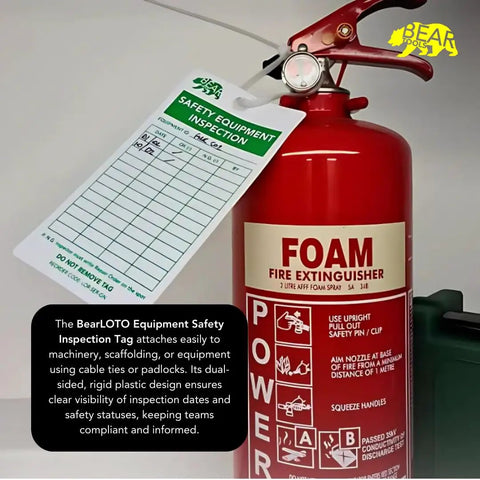 Safety Equipment Inspection Notice for Hazard and Accident Prevention Tags attached to foam fire extinguisher.