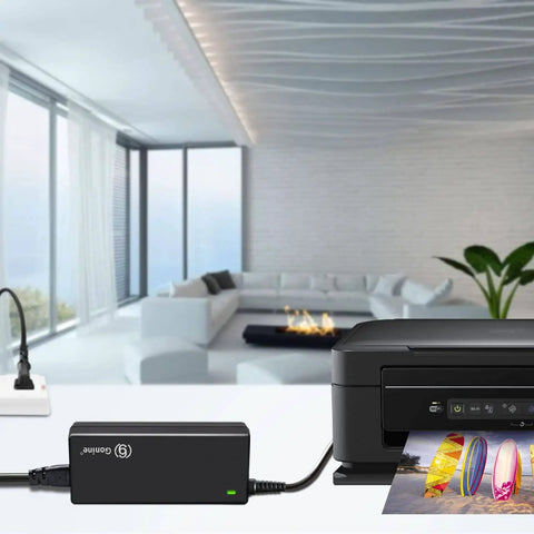 Universal 24V DC Power Supply Adapter 2.5A 60W With 8 Tips 100 240V AC To DC Converter connected to a printer in a modern living room