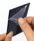 Hand removing protective film from Micro Solar Panels Kit With Wire Five Pack 5V 200mA Polycrystalline PV Cells 4.33 X 2.36 Inches