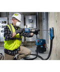 Construction worker using SDS Plus Bulldog Rotary Hammer with Two Cutter Head Three Quarter Inch By Twenty Four Inch bit for concrete drilling