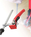 Adjustable Ratchet Workbench Clamp For Woodworking, Quick Acting Desktop Hold Down Fixture in red and steel alloy.