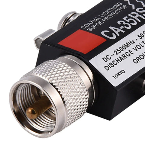 Close-up of UHF Coaxial Lightning Arrester With Male To Female Connector Surge Protector For Coax Systems 0 To 2500 MHz CA 35RS.