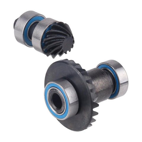 Close-up of CNC machined 24T and 12T steel helical gear set for 1/18 Traxxas TRX4M crawler, showing detailed gear teeth and bearings.