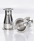 Stainless Steel Tri Clamp Ferrule Reducer Pipe Connector 51mm To 63mm SS304 Health Food Grade, two connectors on white background.