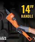 14 Inch Cast Iron Pipe Wrench Heavy Duty Adjustable Plumbing Wrench With I Beam Handle gripping a pipe in a dark space.