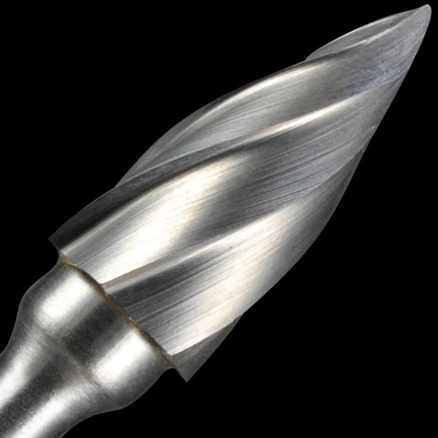 Close-up of a silver carbide burr with 1/8-inch shank and wide-flute spiral cutting edge.