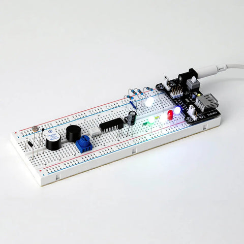 Totally Upgraded Electronics Fun Kit With Power Supply Module And Jumper Wires Precision Potentiometer 830 Tie Points Breadboard Compatible With Arduino And STM32 Over 300 Components Tutorials And Datasheet Included showing components on breadboard