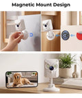 Keep Your Place Secure Hella Sharp 2K Indoor Camera With Full Color Night Vision mounted on a fridge and displaying a pet.