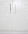 Six Pack Stainless Steel Cabinet Hardware Arched Drawer Pulls 128mm Hole Centers installed on white cabinet doors