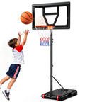 Child playing with Kids Adjustable Basketball Hoop System Portable 3 To 7 Ft For Backyard Driveway Or Indoor Play with shatterproof backboard.