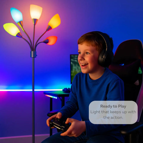 Child playing video games next to Medusa Adjustable Floor Lamp for Bedroom With Five Multi Colored Acrylic Shades Gooseneck Standing Reading Lamp Modern Metal Floor Light in Silver Finish