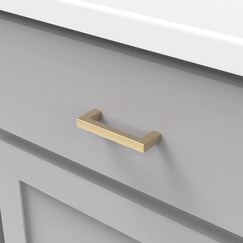 Solid Core Stainless Steel Cabinet Pulls 5-1/16 Inch Center, Heavy Duty Kitchen Drawer Handles mounted on gray cabinet