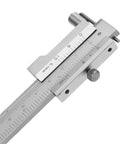 Rock Solid Eight Inch Stainless Scribe Calipers With Replaceable Carbide Tip And Utility Pouch For No Nonsense Layouts On Demanding Job Sites Featuring Exact Dual Scale Readouts And Non Slip Grip close-up of dual scale measurements in millimeters and inches