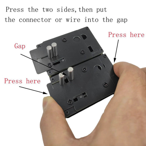Close-up of Pro Grade Soldering Base Fixture Jig for EC5 EC3 and T Connectors with hand pressing for RC battery wiring.