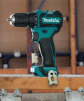 Killer Cordless Driver Drill Packing 12 Volt Max Brushless Power With Precision Chuck And Featherlight Frame For Snug Workspaces And Serious Grinds Daily on a wooden surface.