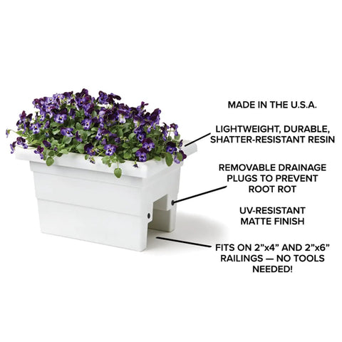 Countryside Rail Planter For 3.5 To 5.5 Inch Railings, White 24-Inch Lightweight Space-Saving Planter Made From Fade-Resistant Plastic With Removable Drainage Plugs, No-Fuss Tool-Free Install, Made In The USA with purple flowers displayed on a railing.