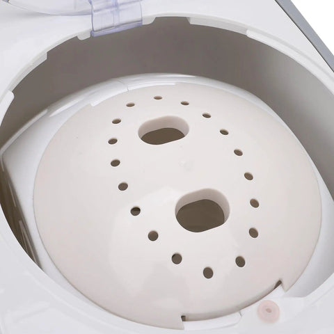 Inside view of No Sweat Portable Manual Hand Crank Clothes Washer with perforated inner drum for effective laundry.
