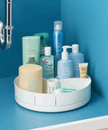 Under Sink Turntable Organizer With Adjustable Dividers, Lazy Susan For Kitchen Or Bathroom Storage, 360 Degree Rotation, 12 Inch, White holding toiletries