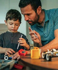 Father and son using 11 Piece Mini Screwdriver Set With Flathead And Phillips Bits For Glasses Watches Phones Toys And Computer Repair