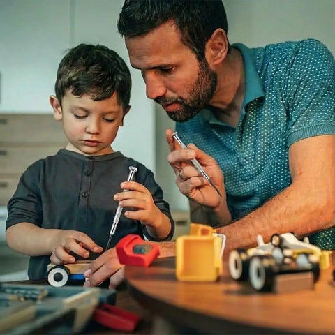 Father and son using 11 Piece Mini Screwdriver Set With Flathead And Phillips Bits For Glasses Watches Phones Toys And Computer Repair