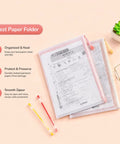 Colorful Four Pack A4 Mesh Zipper Bags with water resistant zippers, test paper folder inside, glasses and pens beside, pink background