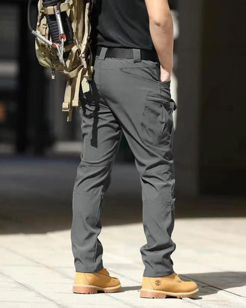 Back view of Mens Tactical Cargo Pants With Stretch Waterproof Fabric Durable Hiking And Work Pants Multi Pocket Cargo Breathable Abrasion Resistant Outdoor Gear No Belt Dark Gray