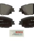 BOSCH QuietCast ceramic brake pad set, four front pads with backing plates and hardware, for select Lexus and Toyota models