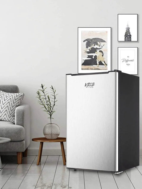 Solid 3.2 Cu Ft Upright Mini Freezer With No Stress Adjustable Thermostat And Removable Shelves For Dorm Office Kitchen Or Bedroom Smooth Chill Stash Setup In Fresh Silver in a modern living space.
