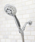 Rio Multi-Function Handheld Shower Head With Hose, Polished Chrome Finish, 5 Spray Settings, side view on white tiled wall