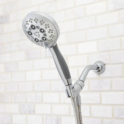 Rio Multi-Function Handheld Shower Head With Hose, Polished Chrome Finish, 5 Spray Settings, side view on white tiled wall