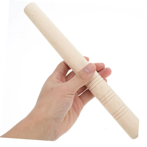 Hand holding wooden sickle handle grip with ergonomic design and noslip comfort for sickle replacement, durable garden tool accessory.