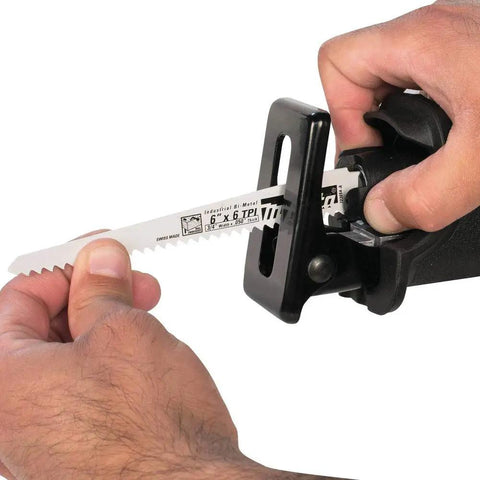 Hands demonstrating tool-free blade change on 18V Cordless Reciprocating Saw Tool Only With Variable Speed Trigger And Tool Free Blade Change For Fast Blade Swaps Easy One Hand Use LXT Compatible Great For Demolition Remodeling And Quick Cuts Blue.
