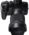 16mm F1.4 DC DN Contemporary Wide Angle Prime Lens For Sony E Mount Low Light Boss with camera attached, front view