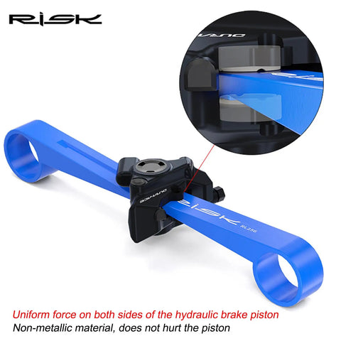Bike Disc Brake Pad Spreader And Piston Reset Tool For Hydraulic Calipers in bright blue, shown with piston alignment detail