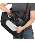 Person placing camera in ProTactic 450 AW II Camera Backpack With All Weather Cover, Built To Haul DSLR, Mirrorless, And Drone Gear