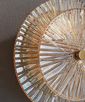 Slick Modern Led Wall Sconce Featuring Copper Details And Lotus Leaf Glass Shade, showcasing intricate glass design.